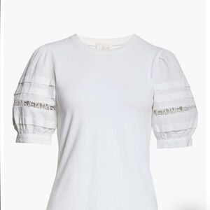 White designer shirt.